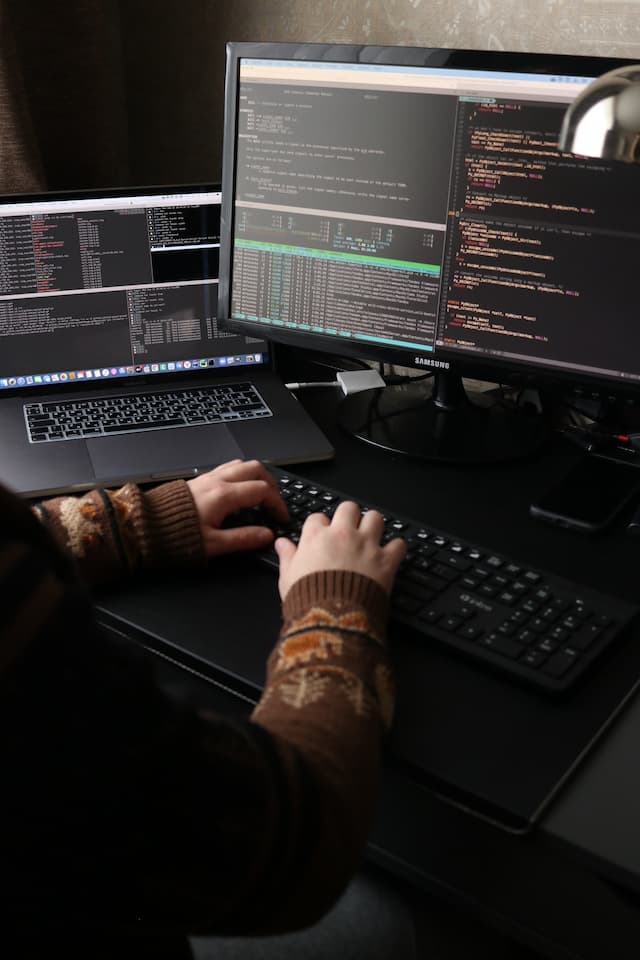man-typing-computer image